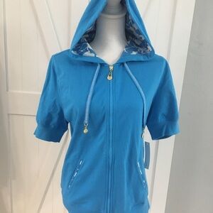 Silverware, blue hooded jacket